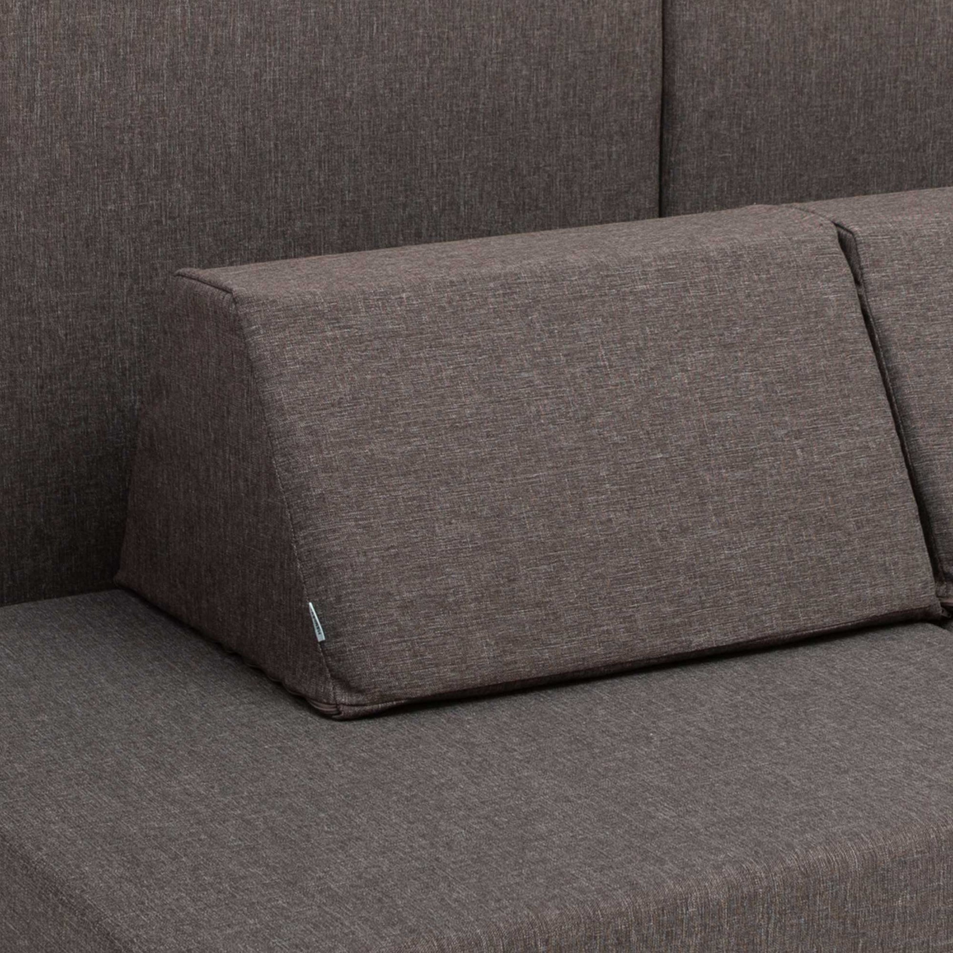 A closeup of a dark brown Monboxy trapezoidal shape