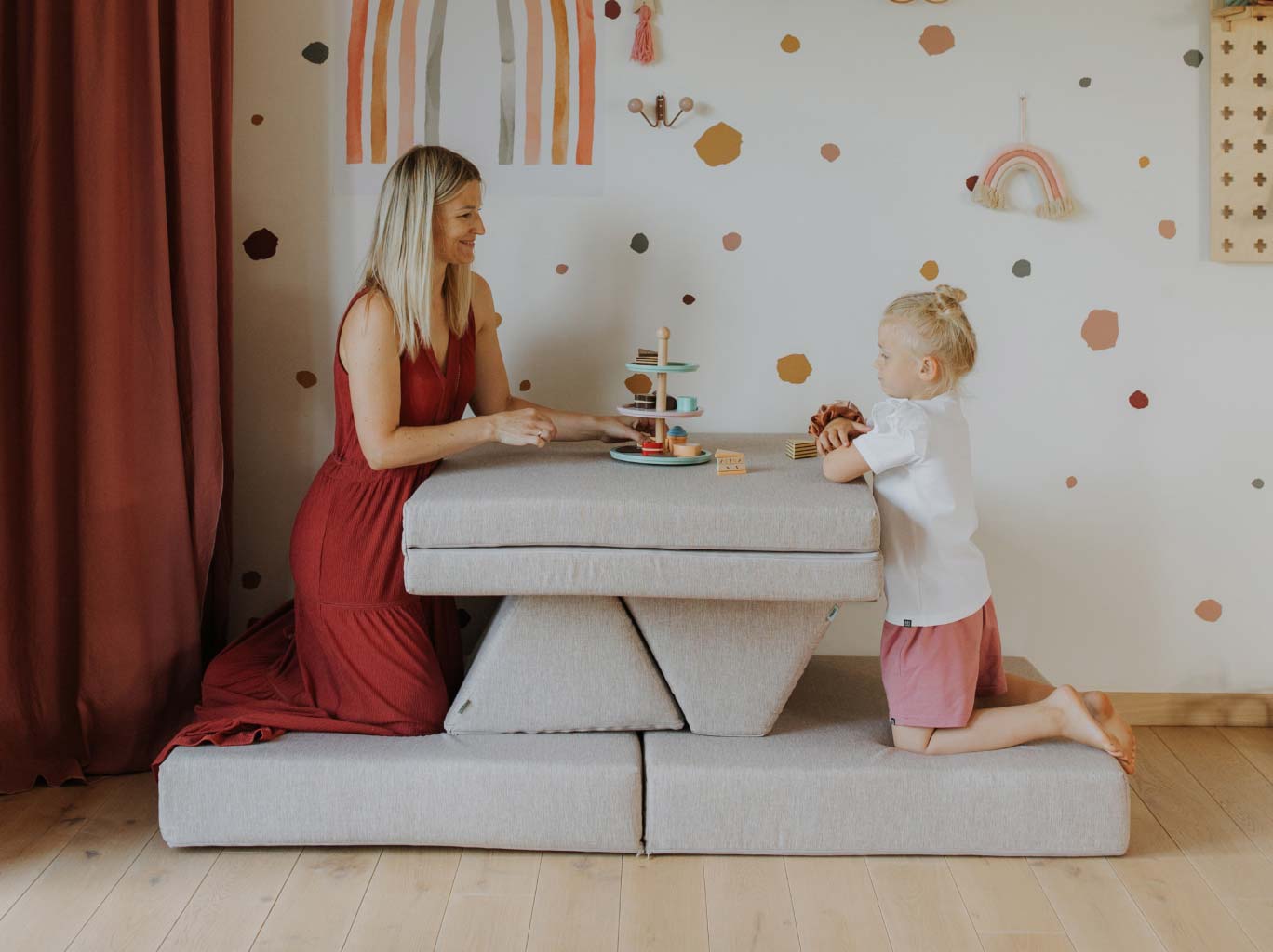 Mommy and daughter playing tea time on their Monboxy play sofa