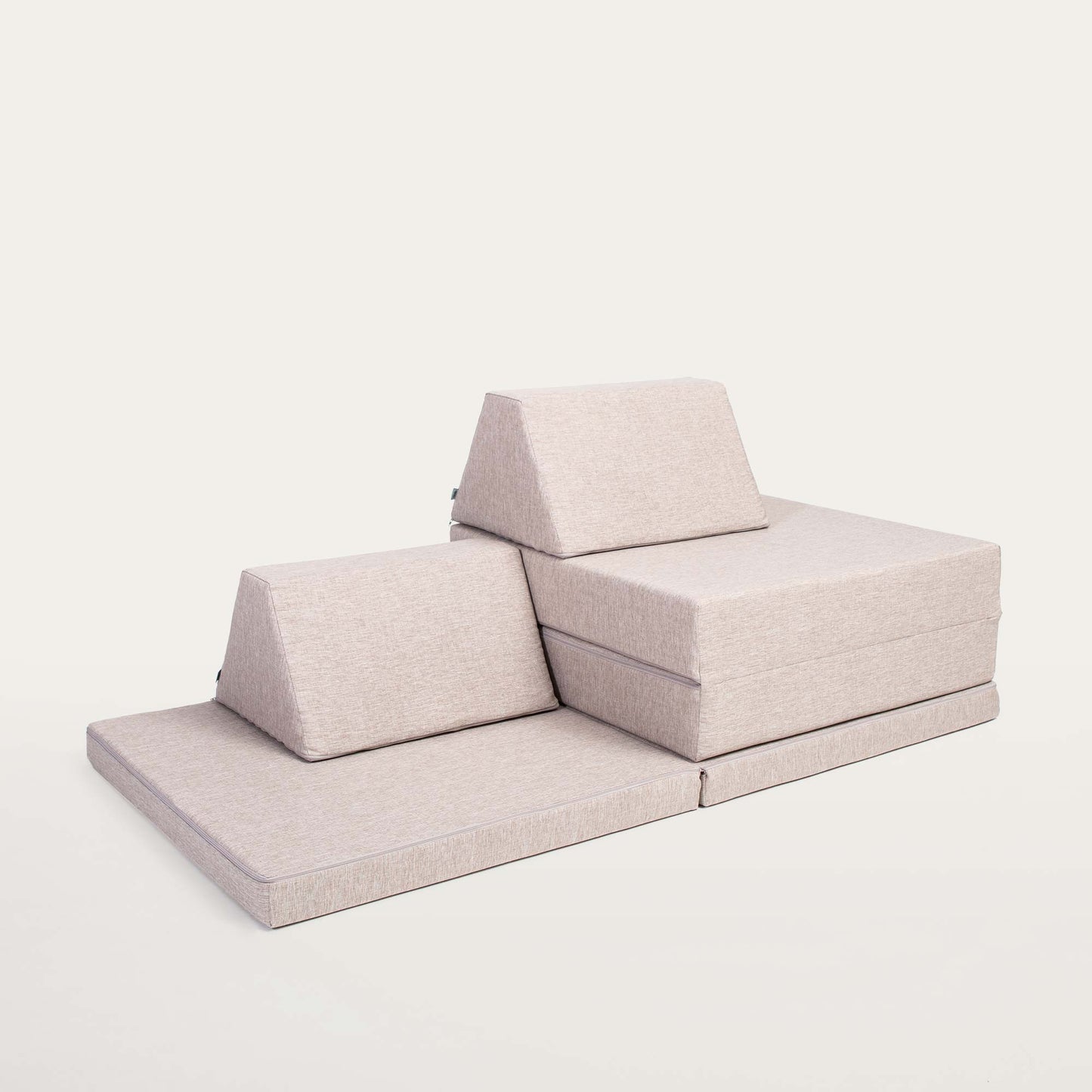 A Beige Monboxy activity sofa set up folded into a two-story seating shape