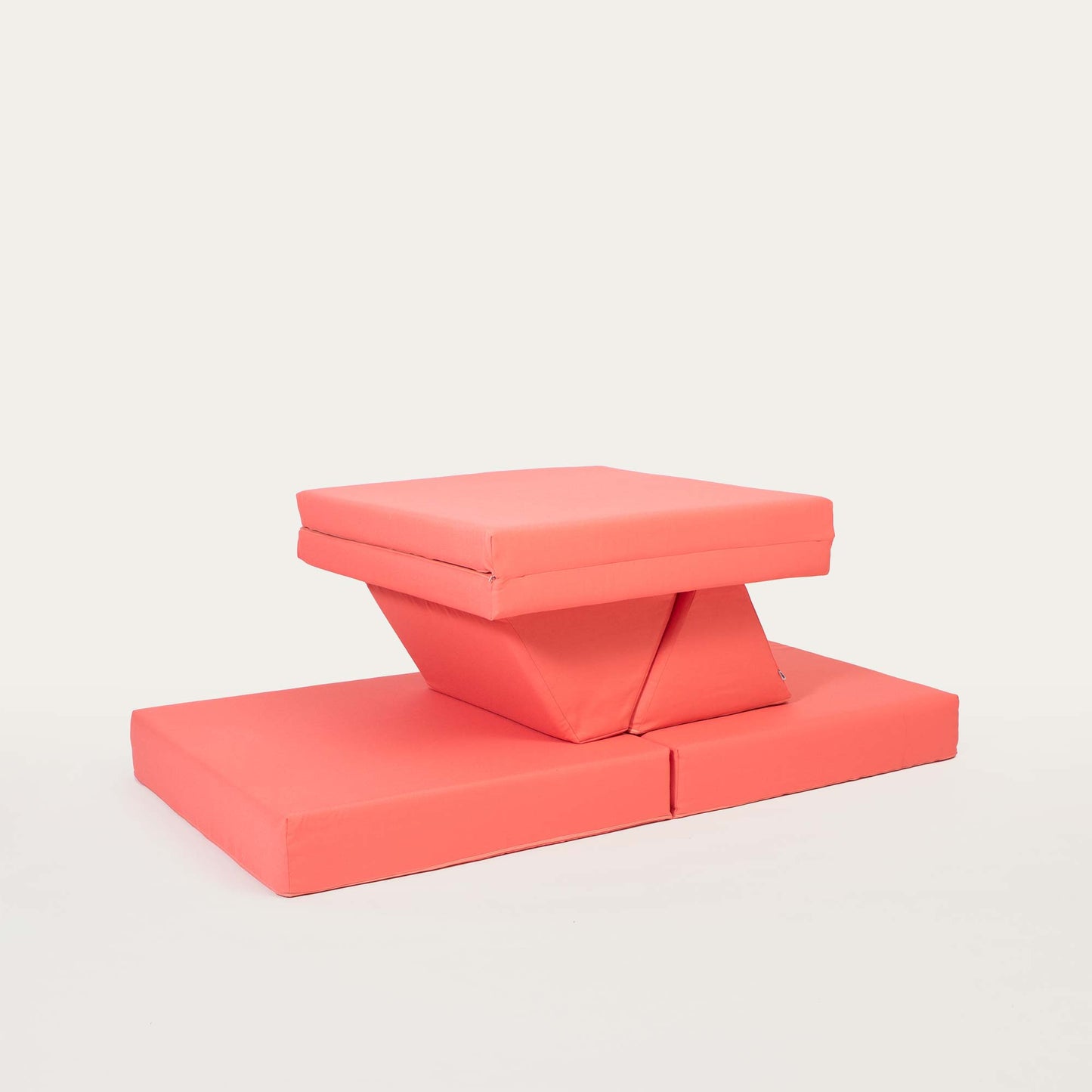 Coral Monboxy activity sofa arranged into a table and chair shape