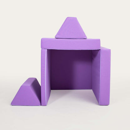 A Purple Monboxy activity couch set arranged into a house shape