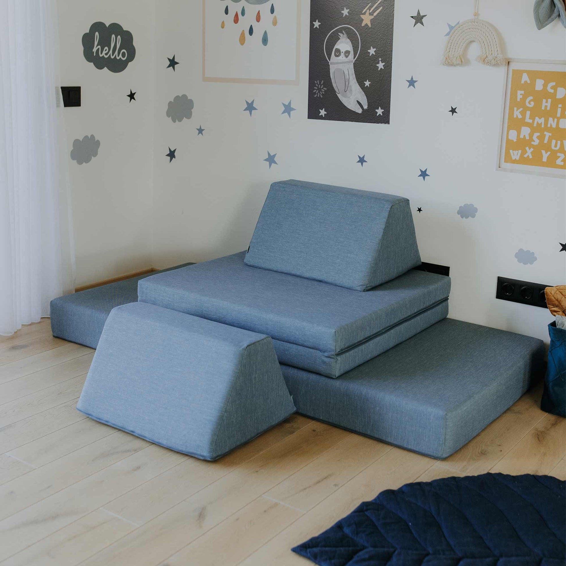 A turquoise Monboxy soft blocks activity couch for kids